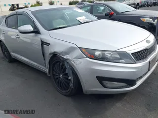 2013 Kia Optima LX with VIN KNAGM4A75D5430974, listed as a IAAI auction lot 41209055 with 197,871 mi miles. Bid and sale history available at carsss.com. Image 1.