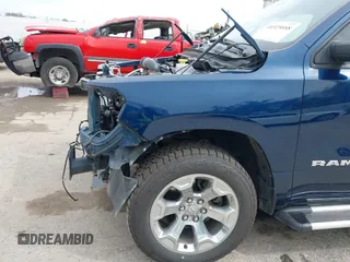 2019 Ram 1500 Big Horn/Lone Star with VIN 1C6SRFFT7KN663677, listed as a IAAI auction lot 40325088 with 77,035 mi miles. Bid and sale history available at carsss.com. Image 21.
