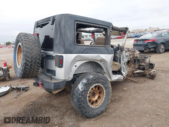 2009 Jeep Wrangler X with VIN 1J4FA24149L775557, listed as a IAAI auction lot 42363653 with Not provided miles and . Bid and sale history available at DreamBid. Image 4.