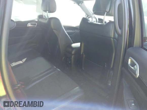 2021 Jeep Grand Cherokee Freedom with VIN 1C4RJFAG5MC704072, listed as a IAAI auction lot 41928963 with 65,073 mi miles and . Bid and sale history available at DreamBid. Image 8.