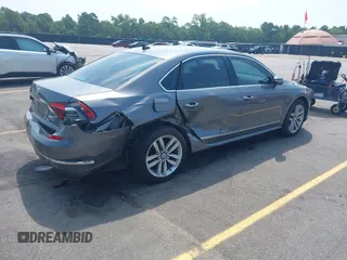 2017 Volkswagen Passat SE with VIN 1VWGT7A33HC058764, listed as a IAAI auction lot 42668036 with 76,732 mi miles and . Bid and sale history available at DreamBid. Image 4.