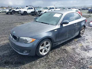 2013 BMW 1 Series 128i with VIN WBAUP7C5XDVP24796, listed as a IAAI auction lot 41807533 with 157,614 mi miles and . Bid and sale history available at carsss.com. Image 2.