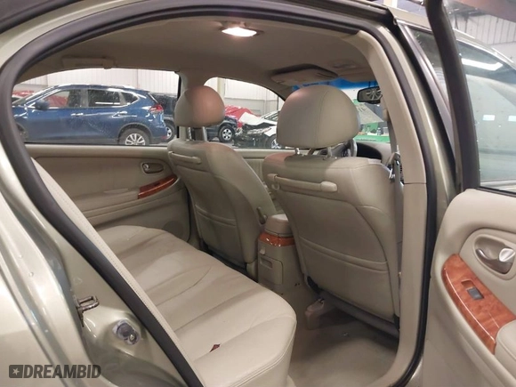 2003 Infiniti I35 Luxury with VIN JNKDA31A53T117792, listed as a IAAI auction lot 41210068 with 94,684 mi miles. Bid and sale history available at carsss.com. Image 8.