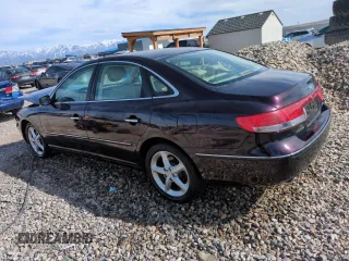 2006 Hyundai Azera SE with VIN KMHFC46F36A057974, listed as a Copart auction lot 52179905 with 142,391 mi miles and Salvage Title. Bid and sale history available at DreamBid. Image 2.