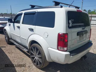 2011 Dodge Nitro Heat with VIN 1D4PT4GX9BW587284, listed as a IAAI auction lot 41998357 with 100,366 mi miles and . Bid and sale history available at DreamBid. Image 3.