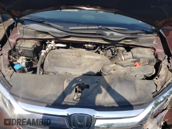 2018 Honda Odyssey EX with VIN 5FNRL6H55JB037386, listed as a Copart auction lot 63577475 with 125,498 mi miles and Salvage title. Bid and sale history available at DreamBid. Image 12.