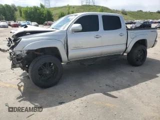 2012 Toyota Tacoma with VIN 5TFLU4ENXCX027960, listed as a Copart auction lot 60689025 with 209,480 mi miles and Salvage title. Bid and sale history available at DreamBid. Image 1.