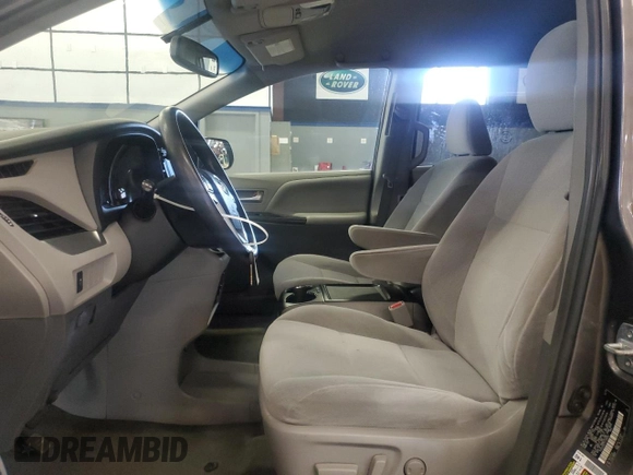 2015 Toyota Sienna LE with VIN 5TDJK3DC7FS105502, listed as a Copart auction lot 61672045 with 183,035 mi miles and Clean title. Bid and sale history available at DreamBid. Image 7.