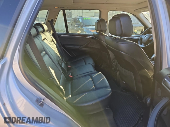 2011 BMW X5 35i with VIN 5UXZV4C54BL410887, listed as a Copart auction lot 77017594 with 111,629 mi miles and Clean Title. Bid and sale history available at carsss.com. Image 6.