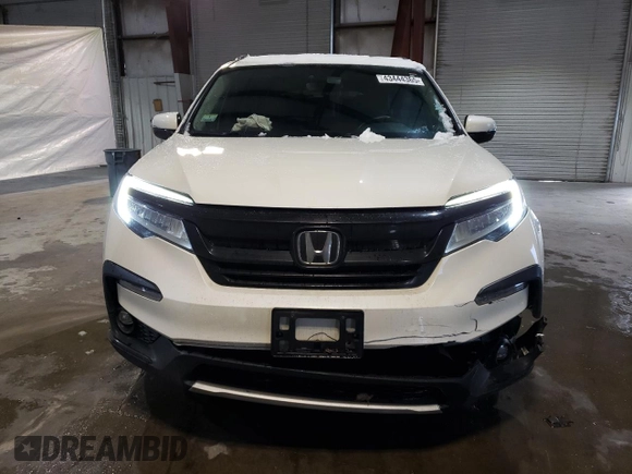 2019 Honda Pilot Touring 7-Passenger with VIN 5FNYF6H65KB049695, listed as a Copart auction lot 43444365 with 79,023 mi miles and Salvage Title. Bid and sale history available at DreamBid. Image 5.