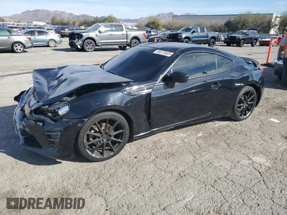 2017 Toyota 86 z VIN JF1ZNAA11H8704619, wystawiony jako Copart lot #50272835 z przebiegiem 104 096 mil mil oraz Szkoda całkowita • Salvage title. Historia ofert i sprzedaży dostępna na DreamBid. Obrazek 1.
