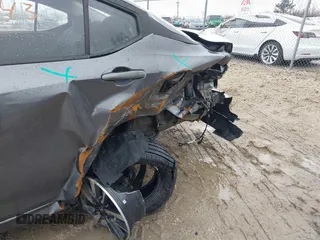 2024 Nissan Versa SV z VIN 3N1CN8EV7RL843827, wystawiony jako IAAI lot #41741043 z przebiegiem 9 062 mil mil oraz . Historia ofert i sprzedaży dostępna na DreamBid. Obrazek 18.