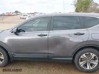 2021 Honda CR-V LX with VIN 2HKRW1H21MH402605, listed as a IAAI auction lot 41594378 with 70,617 mi miles. Bid and sale history available at carsss.com. Image 14.