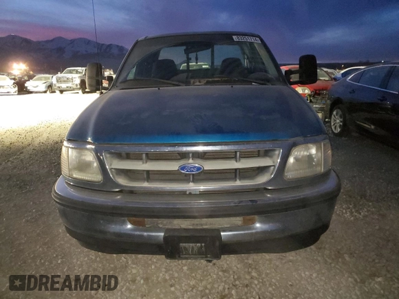 1997 Ford F-150 with VIN 1FTDX1729VND13052, listed as a Copart auction lot 83251714 with 134,450 mi miles and Salvage title. Bid and sale history available at DreamBid. Image 5.