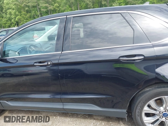 2021 Ford Edge Titanium z VIN 2FMPK3K99MBA16882, wystawiony jako IAAI lot #42214606 z przebiegiem 140 031 mil mil oraz . Historia ofert i sprzedaży dostępna na DreamBid. Obrazek 14.