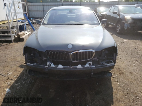 2006 BMW 7 Series 750Li with VIN WBAHN83546DT34797, listed as a Copart auction lot 60511685 with 92,565 mi miles and Salvage title. Bid and sale history available at DreamBid. Image 5.