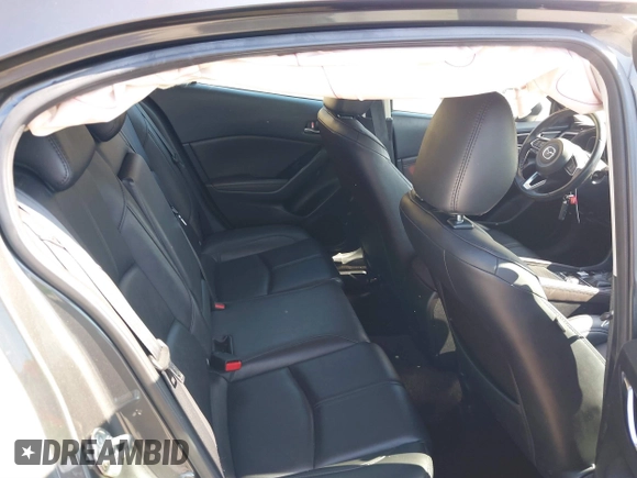 2018 Mazda 3 Touring z VIN 3MZBN1L38JM243749, wystawiony jako IAAI lot #41771812 z przebiegiem 65 533 mil mil oraz . Historia ofert i sprzedaży dostępna na DreamBid. Obrazek 8.
