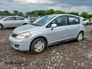 2010 Nissan Versa S with VIN 3N1BC1CP9AL429871, listed as a Copart auction lot 62762125 with 134,109 mi miles and Salvage title. Bid and sale history available at DreamBid. Image 1.