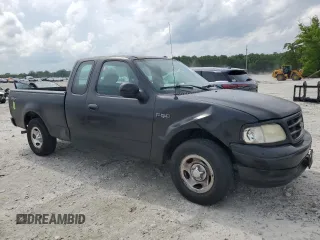 2003 Ford F-150 XL с VIN 1FTRX17273NB20966, выставлен на аукционе Copart как лот 53798005 с пробегом 217 855 миль миль и Списание • Salvage title. История ставок и продаж доступна на DreamBid. Изображение 4.
