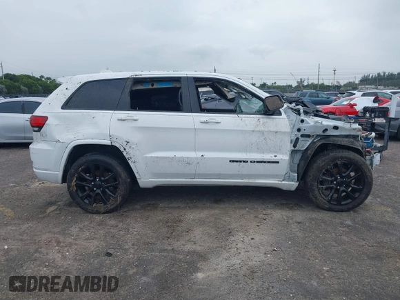 2018 Jeep Grand Cherokee Laredo E with VIN 1C4RJEAG4JC153297, listed as a IAAI auction lot 41364545 with Not provided miles and . Bid and sale history available at DreamBid. Image 13.