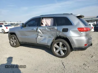 2015 Jeep Grand Cherokee Limited with VIN 1C4RJFBG7FC814526, listed as a Copart auction lot 48572705 with 129,811 mi miles and Salvage Title. Bid and sale history available at carsss.com. Image 2.