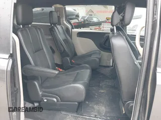 2019 Dodge Grand Caravan SXT with VIN 2C4RDGCGXKR723991, listed as a IAAI auction lot 40670679 with 174,387 mi miles and . Bid and sale history available at DreamBid. Image 8.