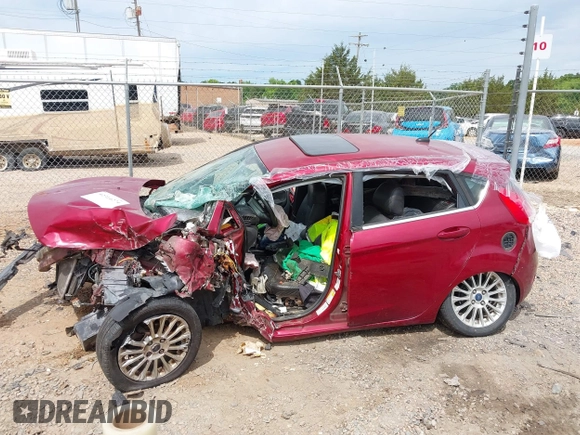 2014 Ford Fiesta Titanium z VIN 3FADP4FJ7EM204194, wystawiony jako IAAI lot #42314274 z przebiegiem 173 088 mil mil oraz . Historia ofert i sprzedaży dostępna na DreamBid. Obrazek 15.