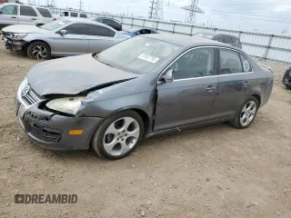 2008 Volkswagen Jetta SE z VIN 3VWRM71K08M099347, wystawiony jako Copart lot #57061795 z przebiegiem 129 225 mil mil oraz Szkoda całkowita • Salvage title. Historia ofert i sprzedaży dostępna na DreamBid. Obrazek 1.