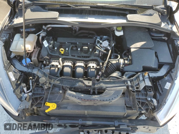 2017 Ford Focus SE with VIN 1FADP3F26HL331253, listed as a Copart auction lot 50869865 with 60,776 mi miles and Salvage title. Bid and sale history available at DreamBid. Image 11.