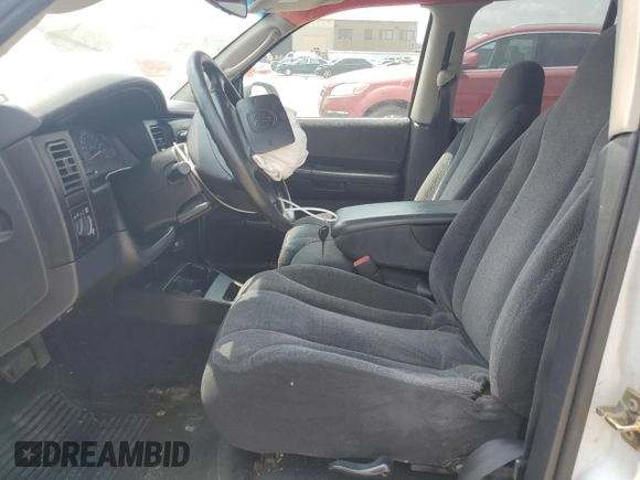 2004 Dodge Dakota SLT with VIN 1D7HL48K14S719751, listed as a Copart auction lot 64031654 with 288,226 mi miles and Salvage Title. Bid and sale history available at DreamBid. Image 7.