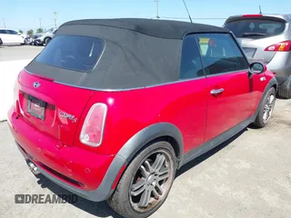 2006 MINI Convertible S with VIN WMWRH335X6TF86044, listed as a IAAI auction lot 42208260 with 165,576 mi miles and . Bid and sale history available at DreamBid. Image 4.