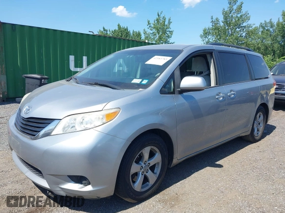 2011 Toyota Sienna LE AAS with VIN 5TDKK3DC2BS096965, listed as a IAAI auction lot 42583783 with 288,489 mi miles and . Bid and sale history available at DreamBid. Image 2.