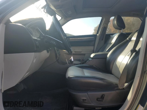 2005 Chrysler 300 with VIN 2C3JA53GX5H563815, listed as a Copart auction lot 81886344 with 144,630 mi miles and Salvage Title. Bid and sale history available at carsss.com. Image 7.