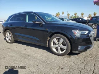 2019 Audi e-tron Premium Plus with VIN WA1LAAGE5KB023079, listed as a Copart auction lot 64977463 with 14,043 mi miles. Bid and sale history available at carsss.com. Image 4.