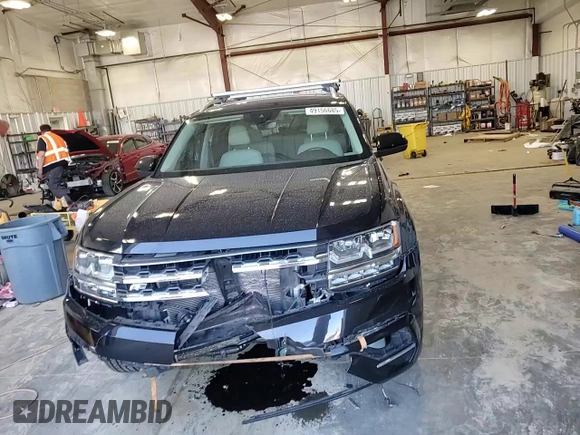 2019 Volkswagen Atlas SE with VIN 1V2XR2CA6KC606410, listed as a Copart auction lot 49156685 with 114,396 mi miles and Salvage title. Bid and sale history available at DreamBid. Image 12.