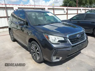 2017 Subaru Forester Touring with VIN JF2SJGTC2HH403805, listed as a IAAI auction lot 42551241 with 104,175 mi miles and . Bid and sale history available at DreamBid. Image 1.