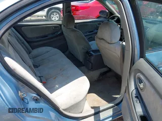 2001 Nissan Maxima GXE with VIN JN1CA31D51T604935, listed as a IAAI auction lot 42504918 with 253,407 mi miles and . Bid and sale history available at DreamBid. Image 8.