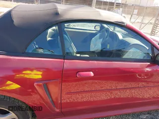 2004 Ford Mustang Deluxe with VIN 1FAFP44694F219365, listed as a IAAI auction lot 41628448 with 124,733 mi miles. Bid and sale history available at carsss.com. Image 14.