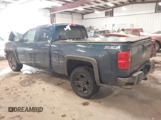 2016 Chevrolet Silverado 1500 LT with VIN 1GCVKREC5GZ296369, listed as a IAAI auction lot 41262302 with 122,859 mi miles. Bid and sale history available at carsss.com. Image 3.