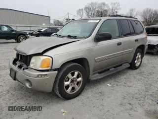 2003 GMC Envoy SLE with VIN 1GKDS13SX32386924, listed as a Copart auction lot 41778545 with 202,006 mi miles and Salvage Title. Bid and sale history available at carsss.com. Image 1.