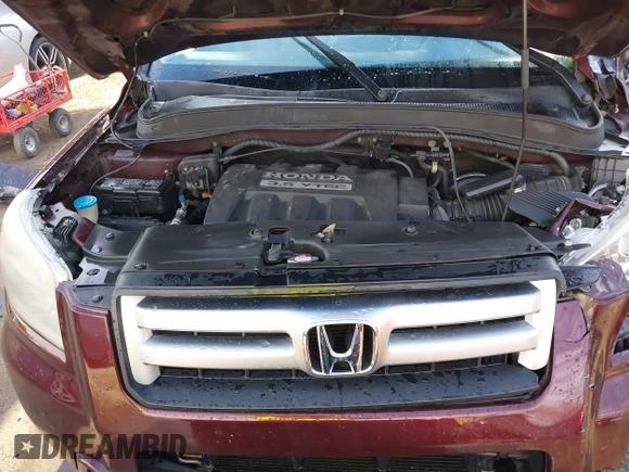 2007 Honda Pilot EX-L with VIN 5FNYF18647B004936, listed as a IAAI auction lot 41656465 with 225,580 mi miles and . Bid and sale history available at DreamBid. Image 10.
