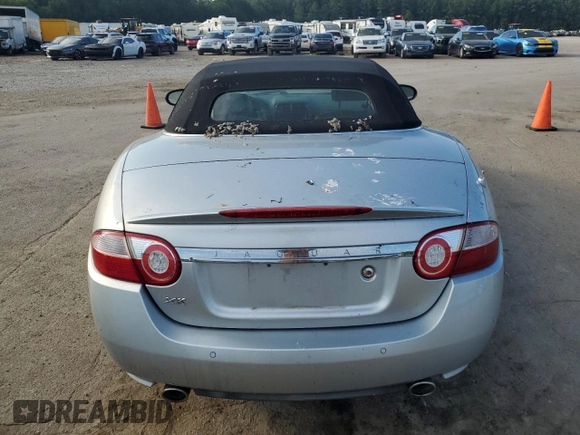 2007 Jaguar XK with VIN SAJDA44B075B01008, listed as a Copart auction lot 69111284 with 0 mi miles and Salvage Title. Bid and sale history available at carsss.com. Image 6.
