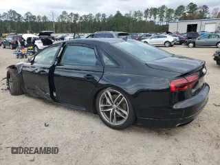 2017 Audi A8 Sport with VIN WAU43AFD4HN005979, listed as a Copart auction lot 48757375 with 148,350 mi miles and Salvage Title. Bid and sale history available at DreamBid. Image 2.