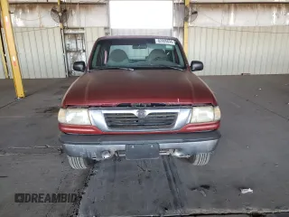 1999 Mazda B-Series 2WD Truck SE with VIN 4F4YR16V0XTM10024, listed as a Copart auction lot 82905694 with 163,025 mi miles and Salvage Title. Bid and sale history available at carsss.com. Image 5.
