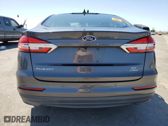 2020 Ford Fusion SE z VIN 3FA6P0LU2LR114869, wystawiony jako Copart lot #58255265 z przebiegiem 93 131 mil mil oraz Szkoda całkowita • Salvage title. Historia ofert i sprzedaży dostępna na DreamBid. Obrazek 6.