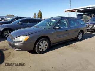2005 Ford Taurus z VIN 1FAHP59U15A158162, wystawiony jako Copart lot #81109994 z przebiegiem 81 196 mil mil oraz Tytuł czysty. Historia ofert i sprzedaży dostępna na DreamBid. Obrazek 1.