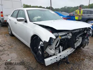 2012 Chrysler 300 Limited with VIN 2C3CCACG8CH283805, listed as a IAAI auction lot 42345492 with 124,181 mi miles and . Bid and sale history available at DreamBid. Image 1.