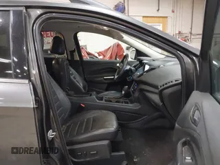 2017 Ford Escape SE with VIN 1FMCU9G9XHUB71008, listed as a IAAI auction lot 40909330 with 181,480 mi miles. Bid and sale history available at carsss.com. Image 5.