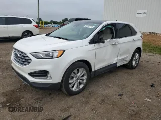 2021 Ford Edge Titanium with VIN 2FMPK4K90MBA34404, listed as a Copart auction lot 61762715 with 45,102 mi miles and Salvage title. Bid and sale history available at DreamBid. Image 1.