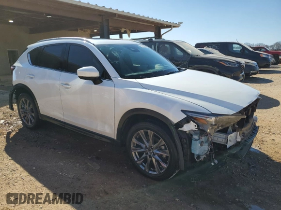2021 Mazda CX-5 Signature with VIN JM3KFBEY5M0352778, listed as a Copart auction lot 47016035 with 37,961 mi miles and Salvage Title. Bid and sale history available at carsss.com. Image 4.